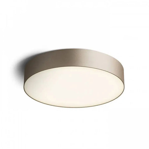 Kullanvärinen minimalistinen kattovalaisin moderniin sisustukseen.