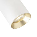 Valkoinen spottivalaisin harjatulla messinkisellä sisäosalla, lähikuva varjostimesta.