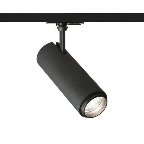 Musta FOCUS 20 LED valonheitin 1-vaihekiskolle, sivunäkymä – Musta FOCUS 20 valonheitin, joka on asennettu 1-vaihekiskoon, kuvattuna sivulta.